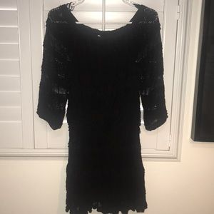 Can be worn on or off shoulders